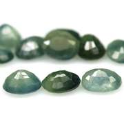 Heated only! 5ct green Sapphire set