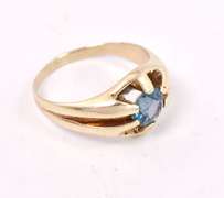 Brilliant Blue Topaz Ring in Yellow Gold