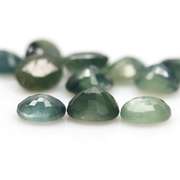 Heated only! 5.47ct blue green Sapphire set