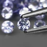 Heavy flashing 4.86ct diamond cut Tanzanite set