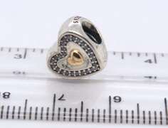 2 Pandora Gold Charms and 3 Silver Charms