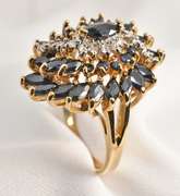 Stylish Pinwheel Cluster of Sapphires Ring