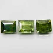 Exotic 2.99ct 3pc matched baguette cut green Sapphire set