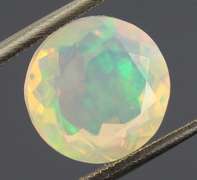 Highly expressive glittering 2.69ct faceted Jelly Opal