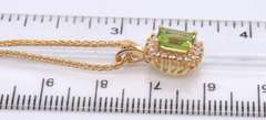 Stunning Yellow Gold Peridot and Diamond Halo Necklace