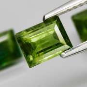 Exotic 2.99ct 3pc matched baguette cut green Sapphire set