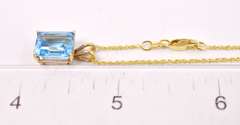 Brilliant Blue Topaz Pendant Necklace in 14K Yellow Gold