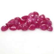Heated only! 12.22ct violet red Ruby set