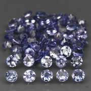 Heavy flashing 4.77ct diamond cut Tanzanite set
