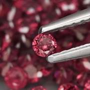 Amazing 7.01ct round cut top violet red Garnet set