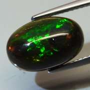 Captivating 2.56ct floral flashing Black Opal