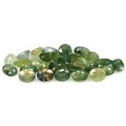 Heated only! 7.42ct oval cut green Sapphire set
