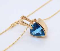 Handsome Yellow Gold Blue Topaz Pendant on Chain