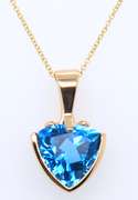 Handsome Yellow Gold Blue Topaz Pendant on Chain