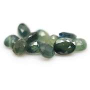 Heated only! 5.47ct blue green Sapphire set