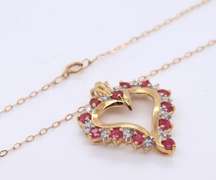Charming Yellow Gold Ruby & Diamond Open Heart Necklace