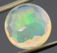 Highly expressive glittering 2.69ct faceted Jelly Opal