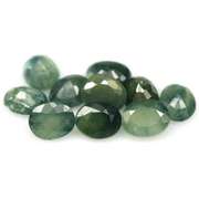 Heated only! 5ct green Sapphire set