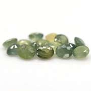 Heated only! 8.29ct oval cut green Sapphire set