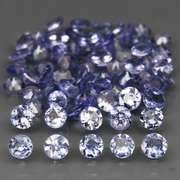 Heavy flashing 4.86ct diamond cut Tanzanite set