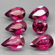 Mixed cut 9.46ct premium cherry pink Rhodolite Garnet set