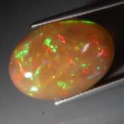 Smoldering! 9.42ct untreated semi-black Welo Opal
