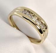 Man's WG Ring with 5 Diamonds