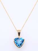 Handsome Yellow Gold Blue Topaz Pendant on Chain