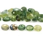 Heated only! 7.42ct oval cut green Sapphire set