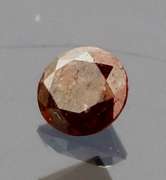Eye catching 0.22ct round cut red Diamond solitaire