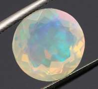 Highly expressive glittering 2.69ct faceted Jelly Opal
