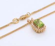 Stunning Yellow Gold Peridot and Diamond Halo Necklace