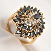 Stylish Pinwheel Cluster of Sapphires Ring