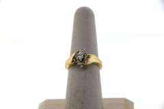 Exquisite Oval Diamond Ring surrounded by Baguette and Round Diamonds on a 14k Gold Band