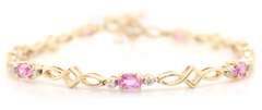 Handsome Yellow Gold pink Sapphire and Diamond Tennis Bracelet