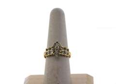 Impeccable Diamond Cluster Ring with Side Stones layered on a 14k Gold Band