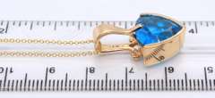 Handsome Yellow Gold Blue Topaz Pendant on Chain