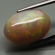 Smoldering 8.07ct full cover flashing Welo Opal