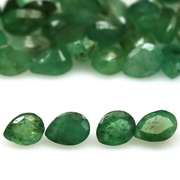 Rich emerald green 8.08ct 36pc emerald set