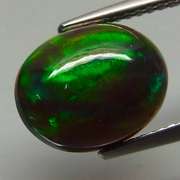 Magnificent 2.56ct floral flashing Black Opal