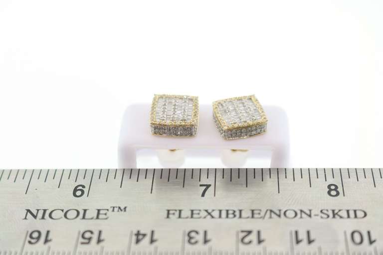 Baguette Diamond Earrings edged with 14k Yellow Gold and Round Diamonds