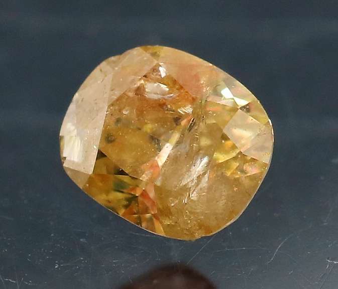 Rare .32ct oval cut golden Diamond