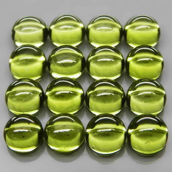 Pristine 10.69ct 16pc lime green Peridot set