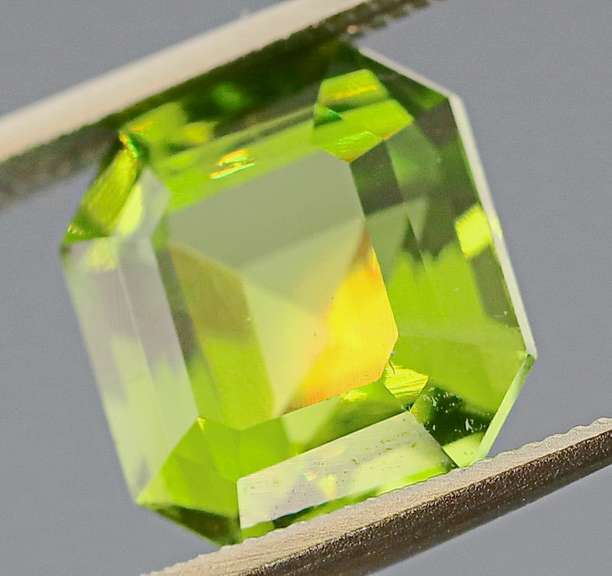 Glittering 4.38ct apple green untreated Peridot