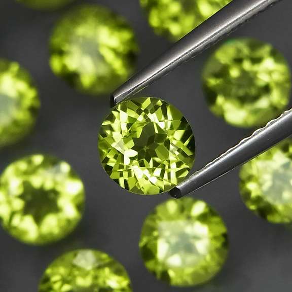 High grade 8.76ct untreated apple green Peridot set