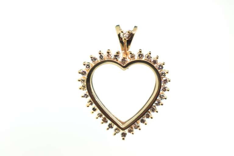 14 KT YELLOW GOLD AND DIAMOND HEART PENDANT