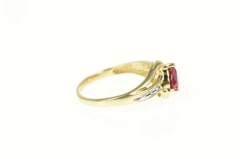 10K Yellow Gold Heart Sim. Ruby Diamond Accent Bypass Ring