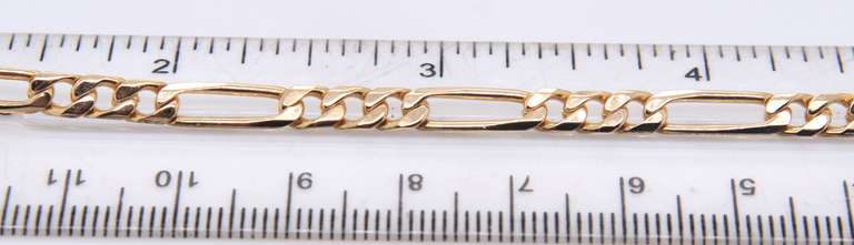 Elegant Yellow Gold Figaro Chain