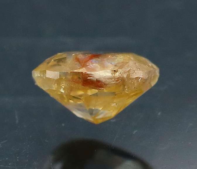 Rare .32ct oval cut golden Diamond