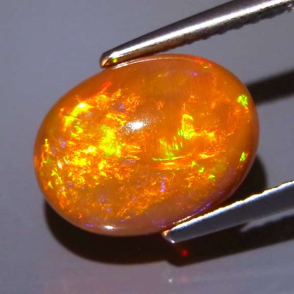 Exceptional 2.54ct full body flashing Semi Black Opal